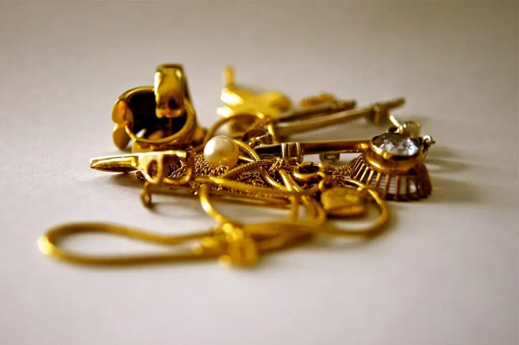 Scrap gold silver and platinum jewelry pieces including chains and rings